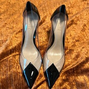 Never worn beautiful 4 inch black tip clear on sides sexy heels!